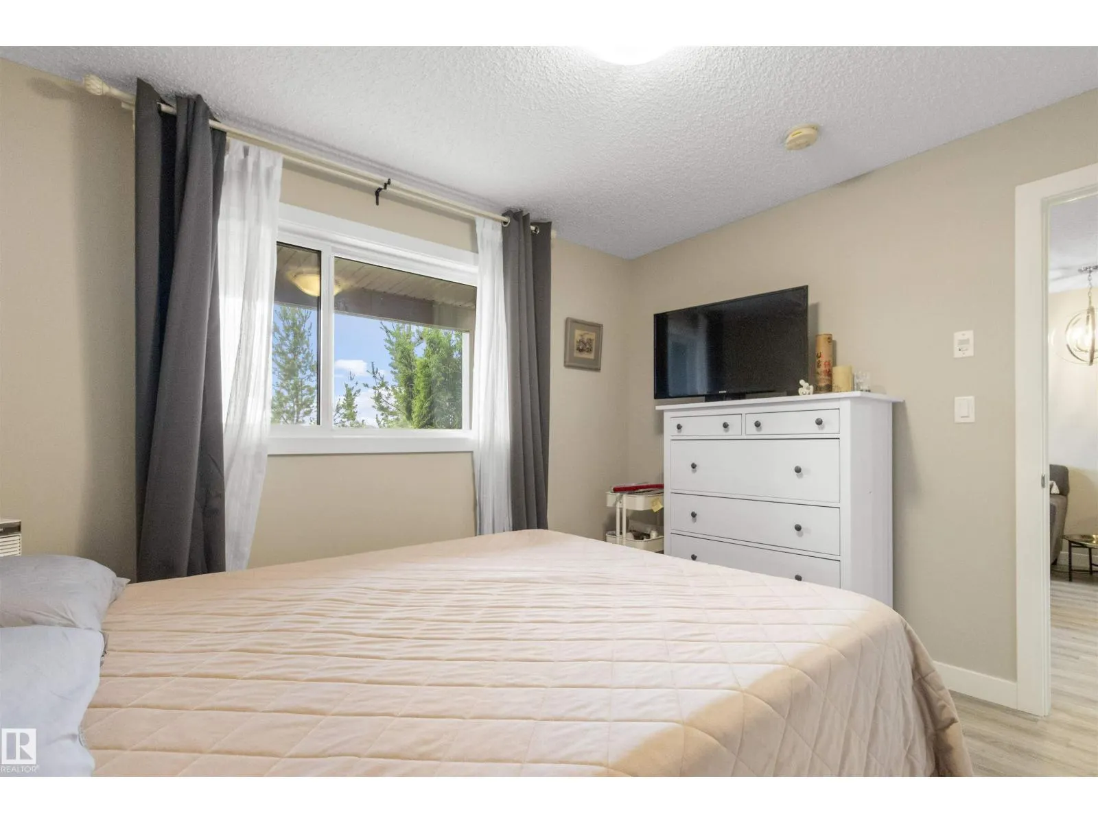 #101 1506 TAMARACK BV NW