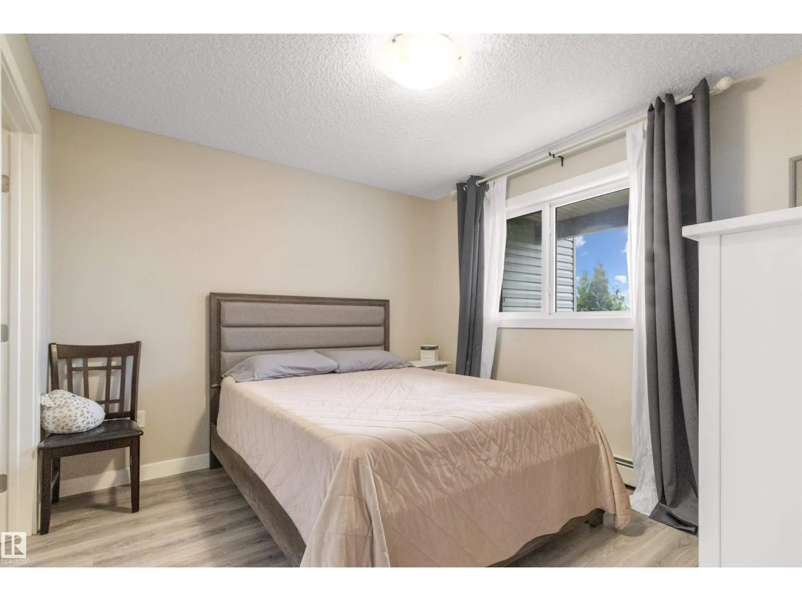 #101 1506 TAMARACK BV NW