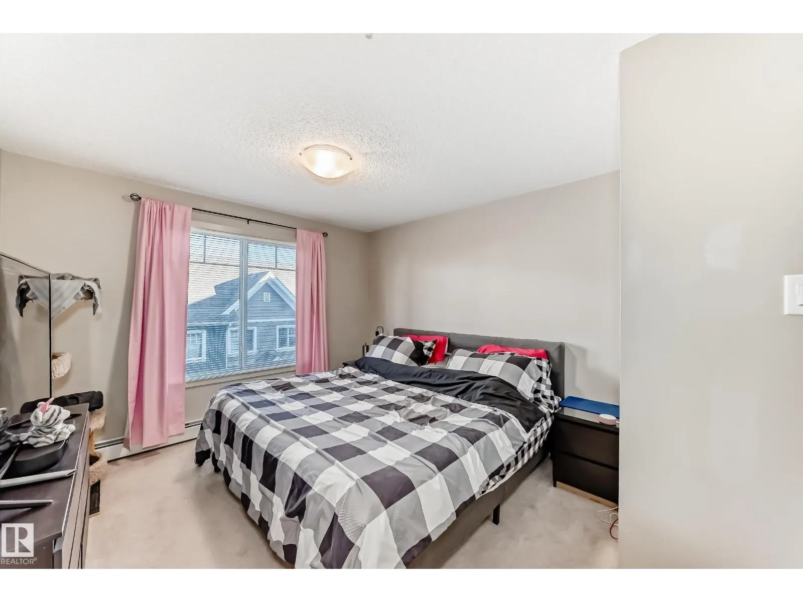 #303 4008 SAVARYN DR SW