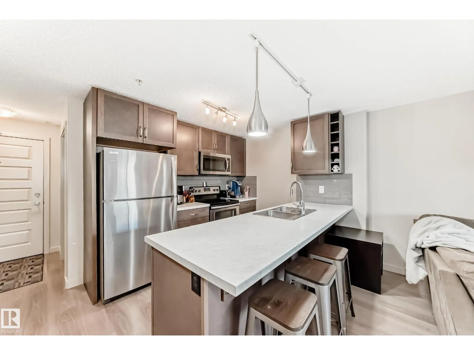 #303 4008 SAVARYN DR SW