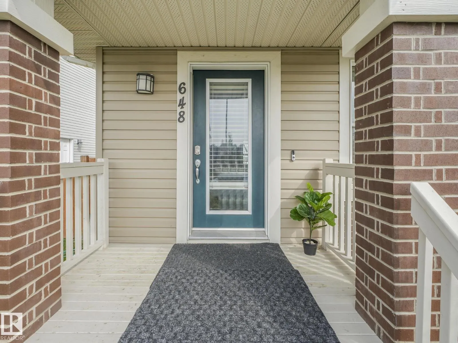 648 LEWIS GREENS DR NW