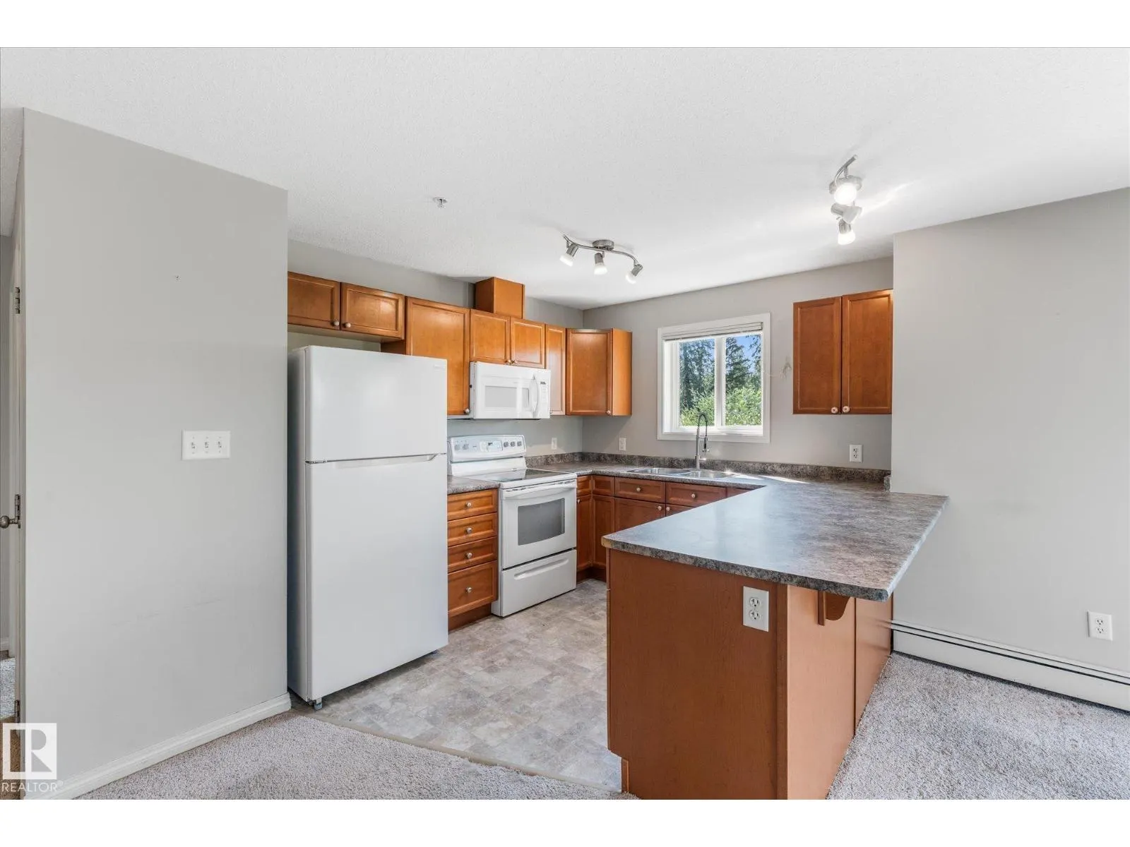 #208 4903 47 AV