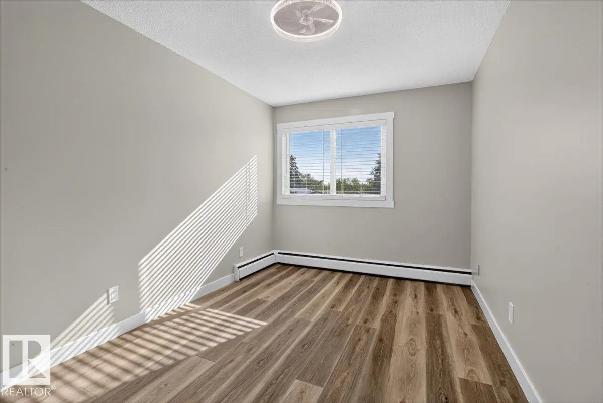 #205 11429 124 ST NW