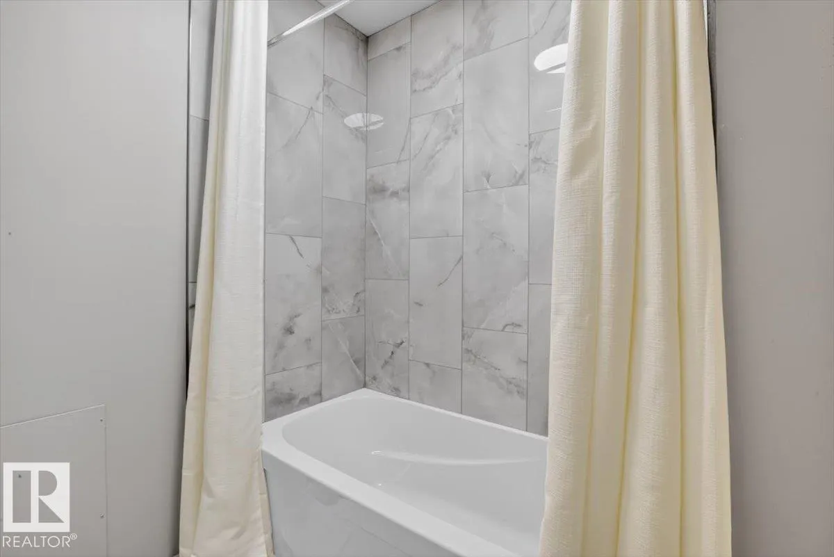 #205 11429 124 ST NW