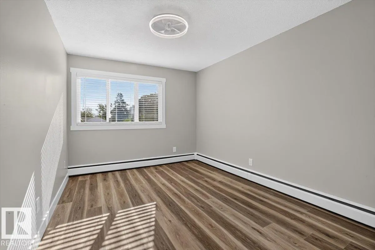 #205 11429 124 ST NW
