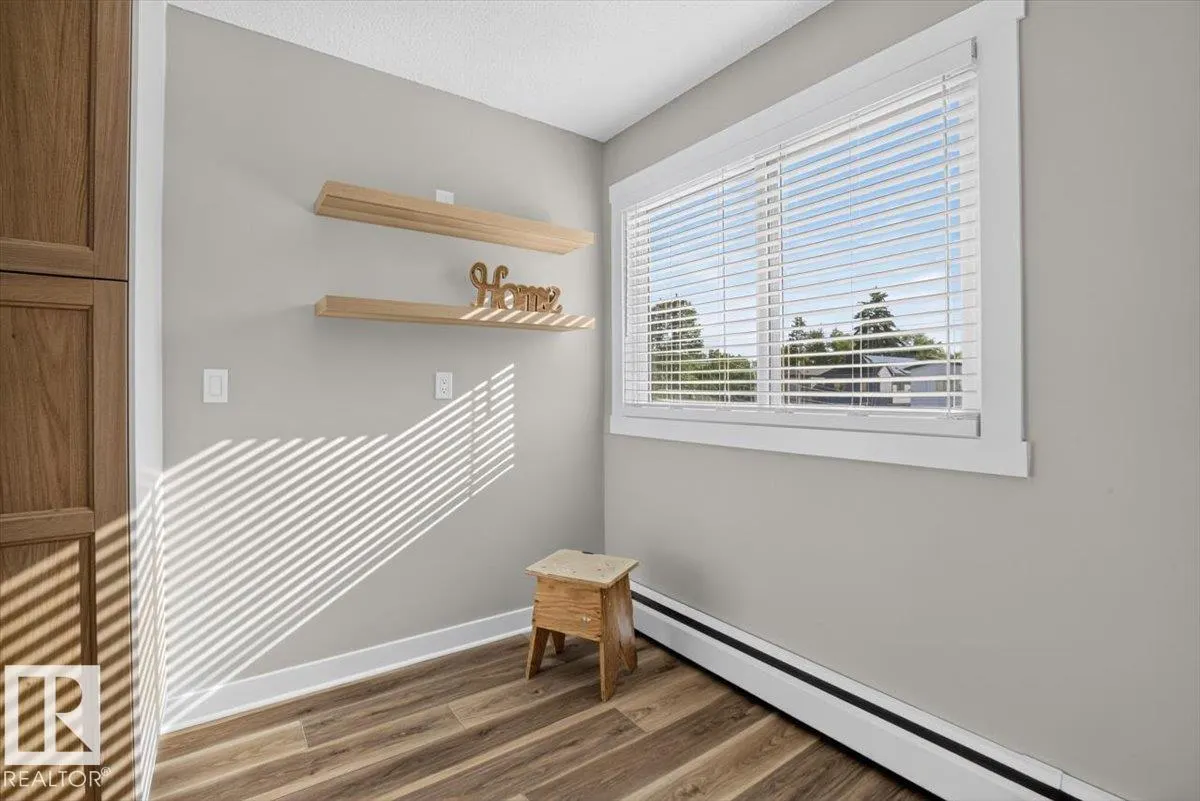 #205 11429 124 ST NW