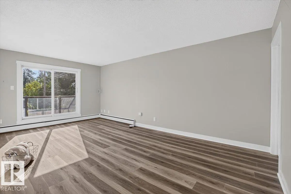 #205 11429 124 ST NW