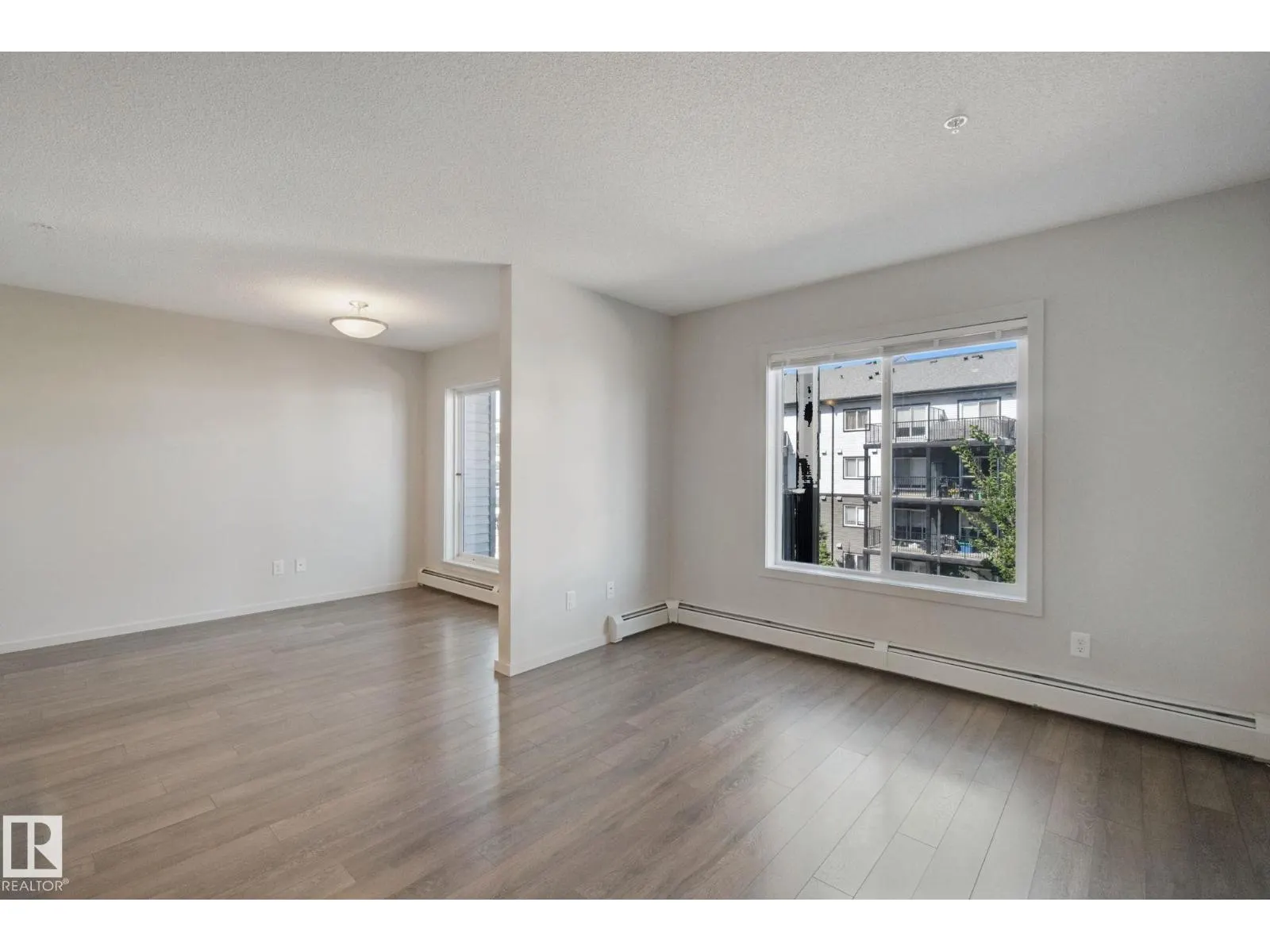 #330 390 Windermere RD NW
