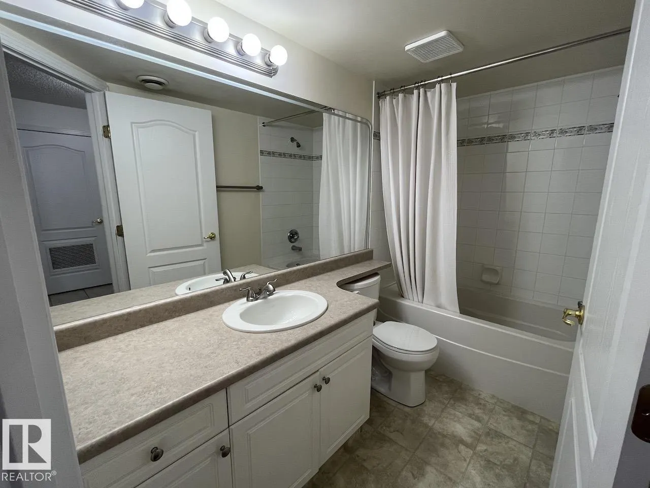 #402 8909 100 ST NW