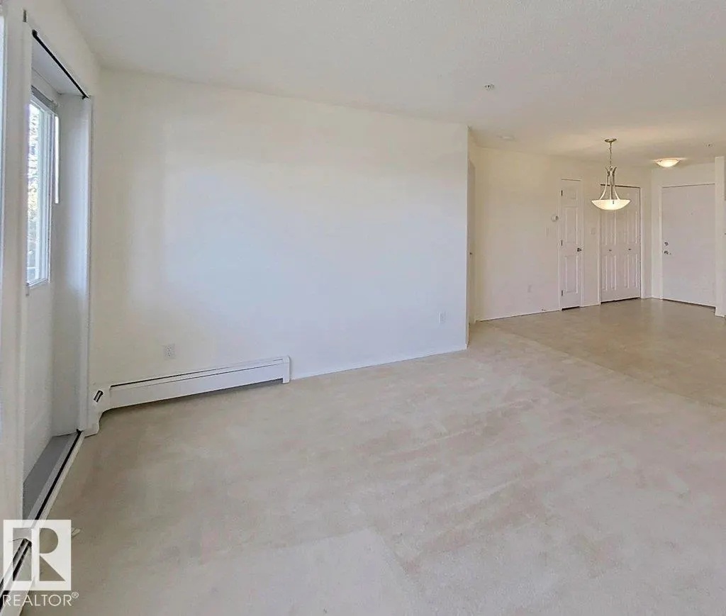 #203 13625 34 ST NW NW
