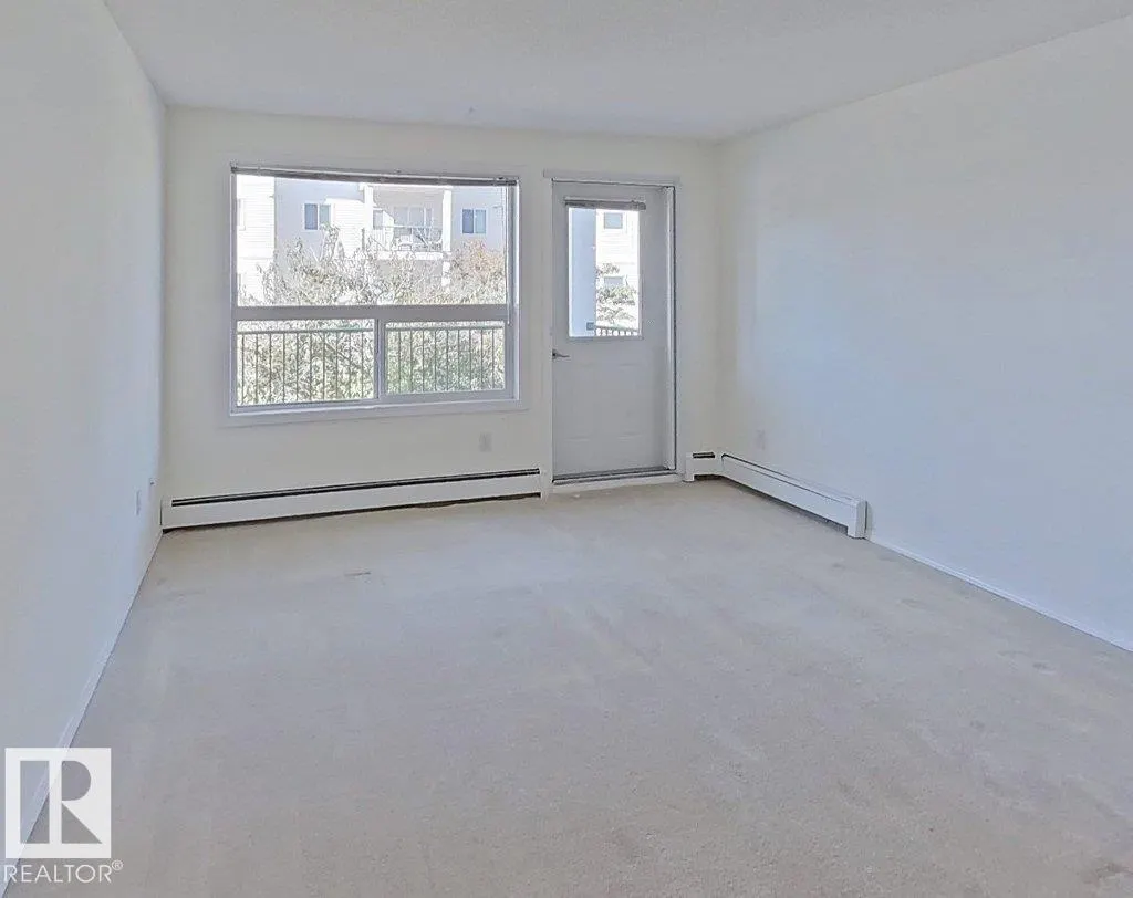 #203 13625 34 ST NW NW