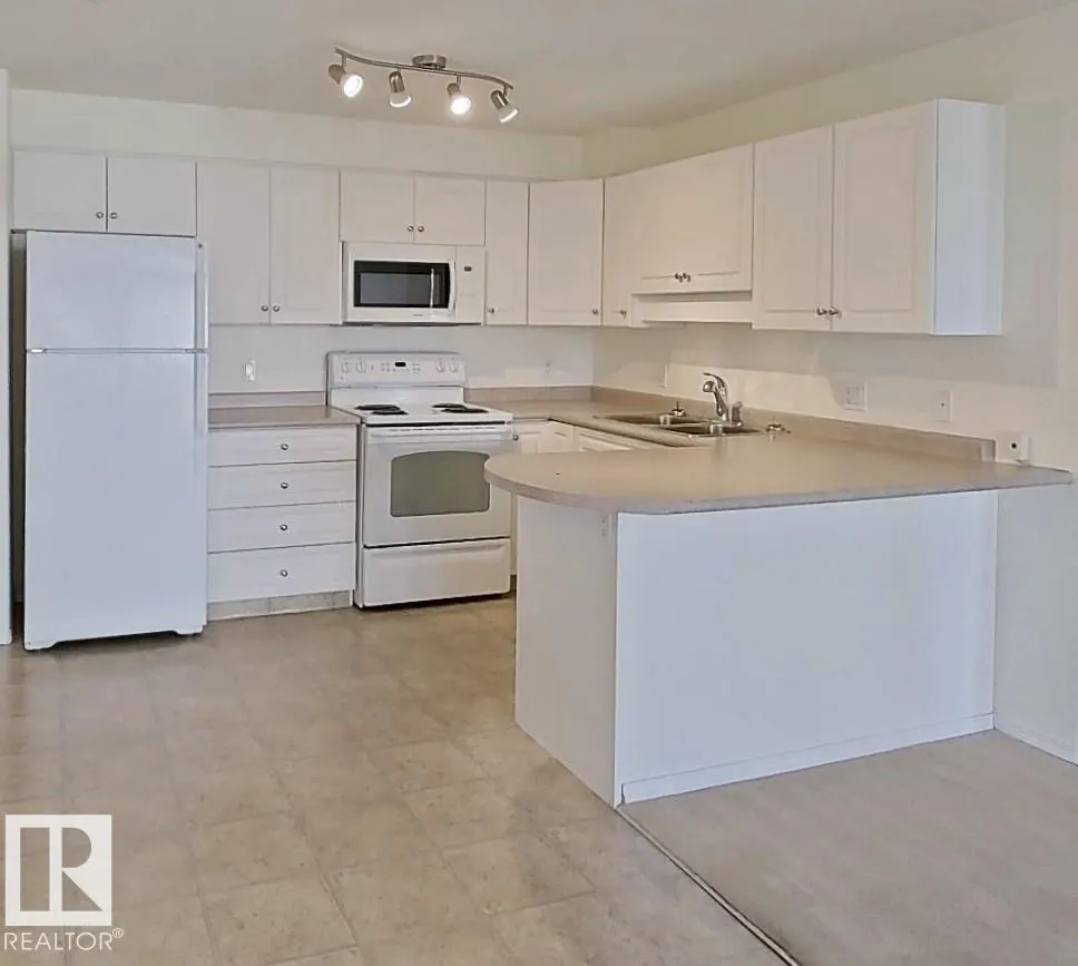 #203 13625 34 ST NW NW