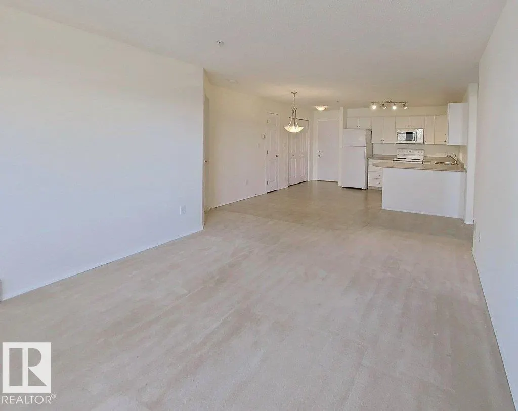 #203 13625 34 ST NW NW