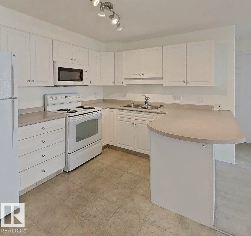 #203 13625 34 ST NW NW