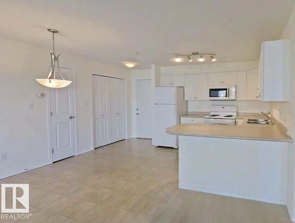 #203 13625 34 ST NW NW