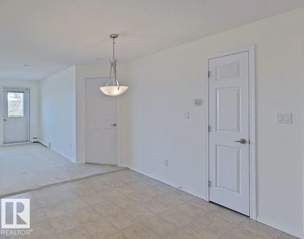 #203 13625 34 ST NW NW