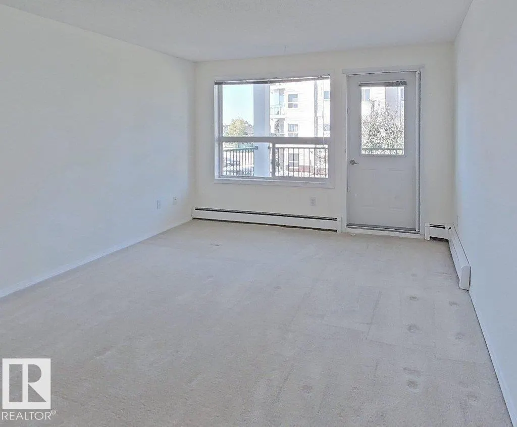 #203 13625 34 ST NW NW