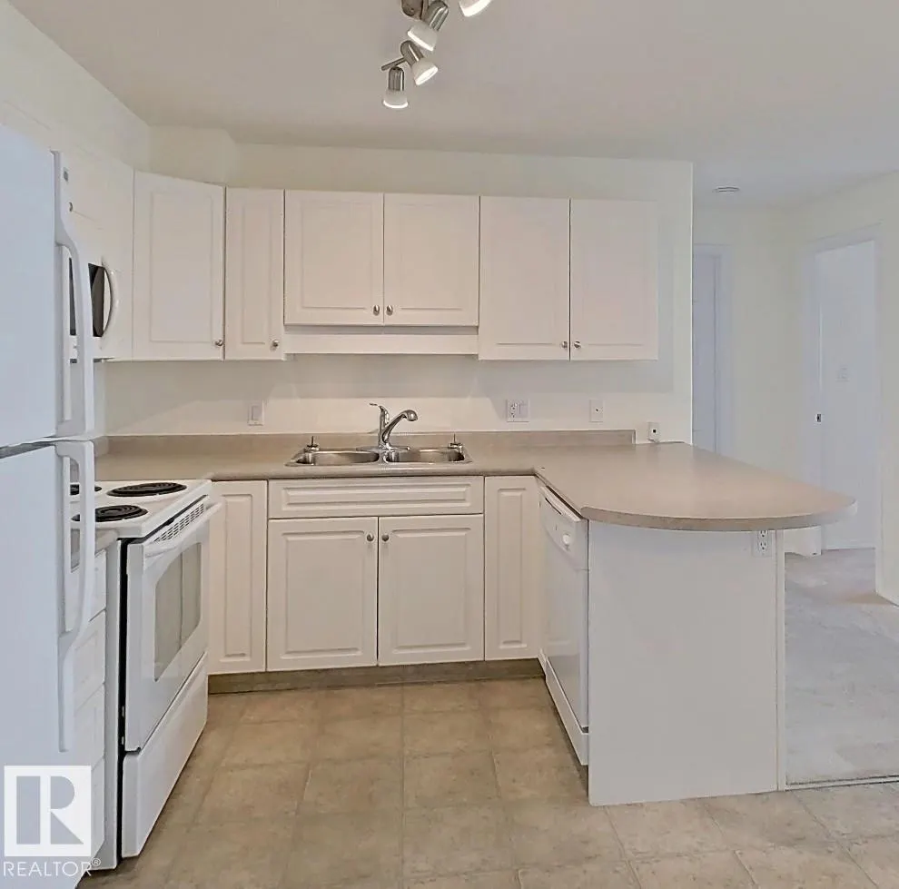 #203 13625 34 ST NW NW