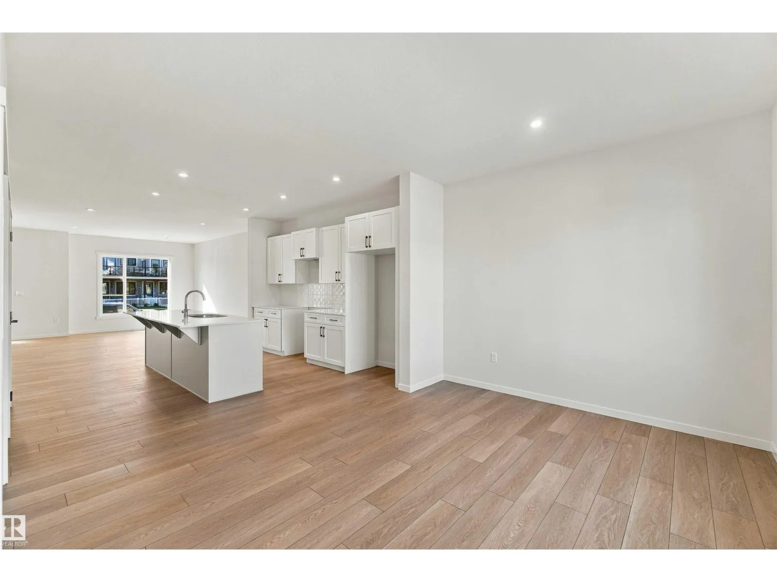 1242 MCLEOD AV