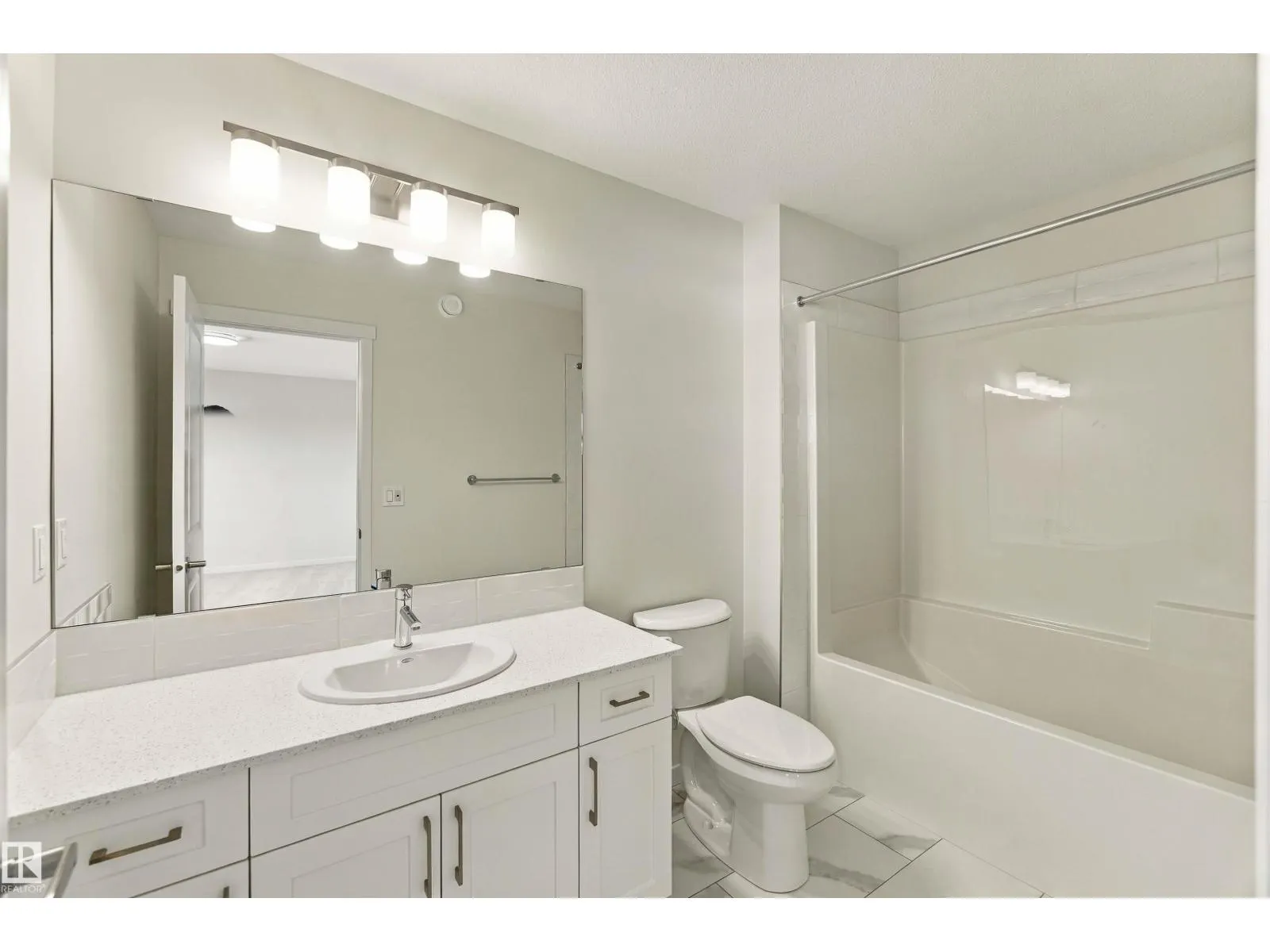 1242 MCLEOD AV