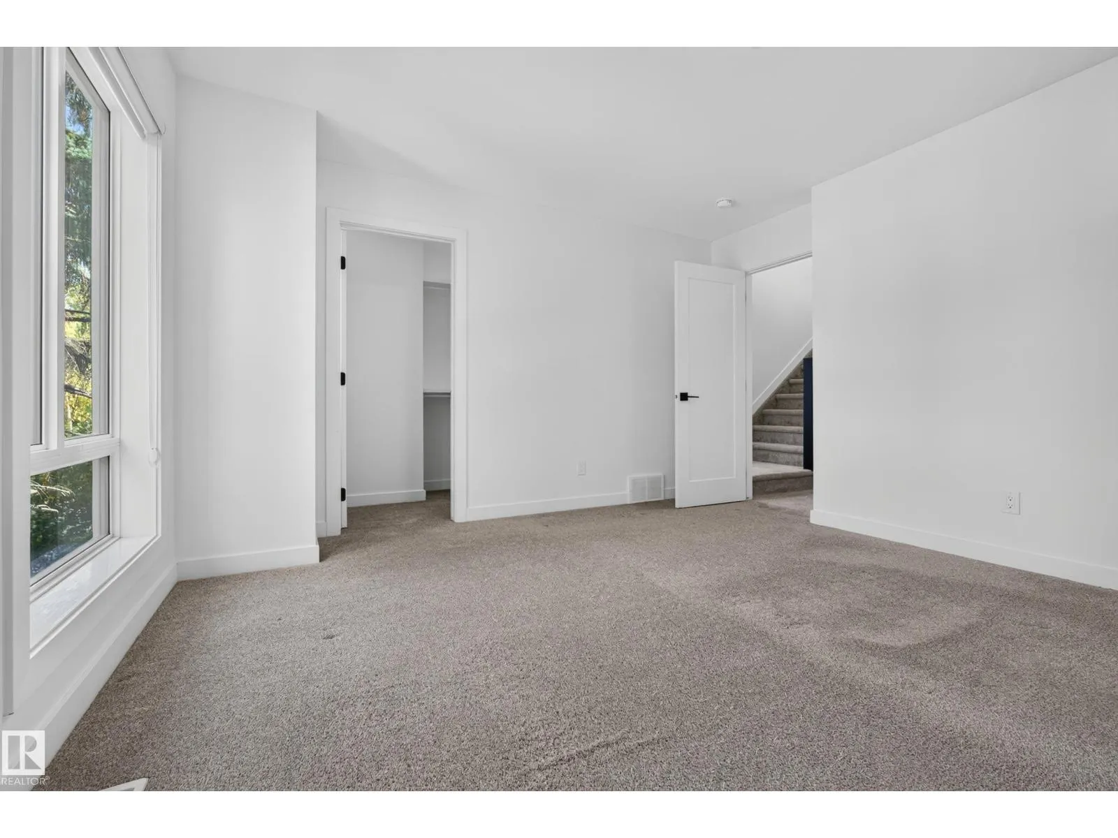 11207 75 AV NW