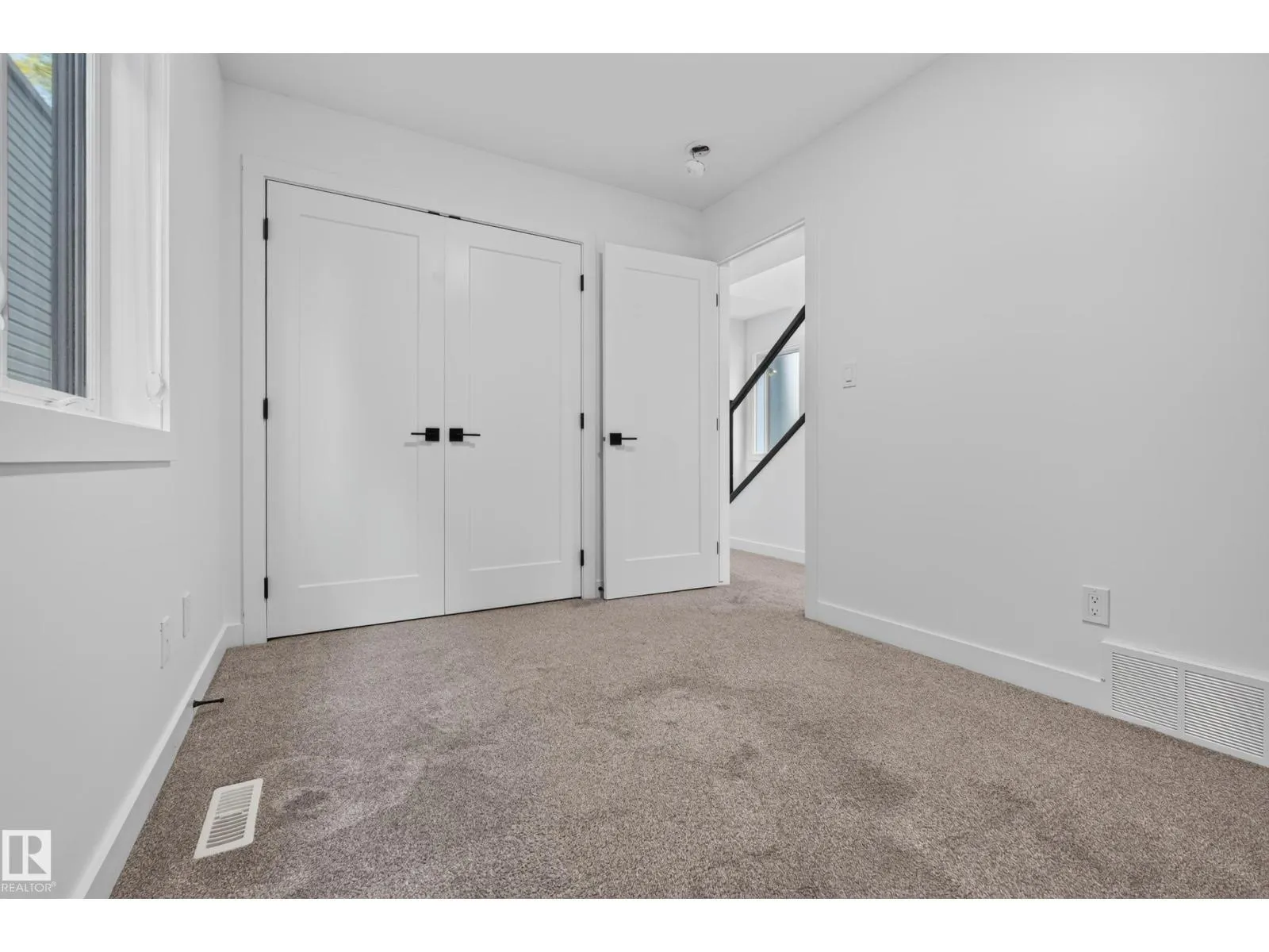 11207 75 AV NW