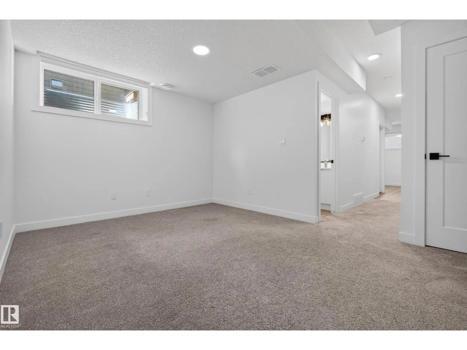 11207 75 AV NW