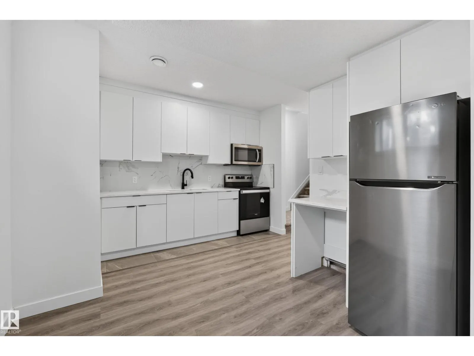 11207 75 AV NW