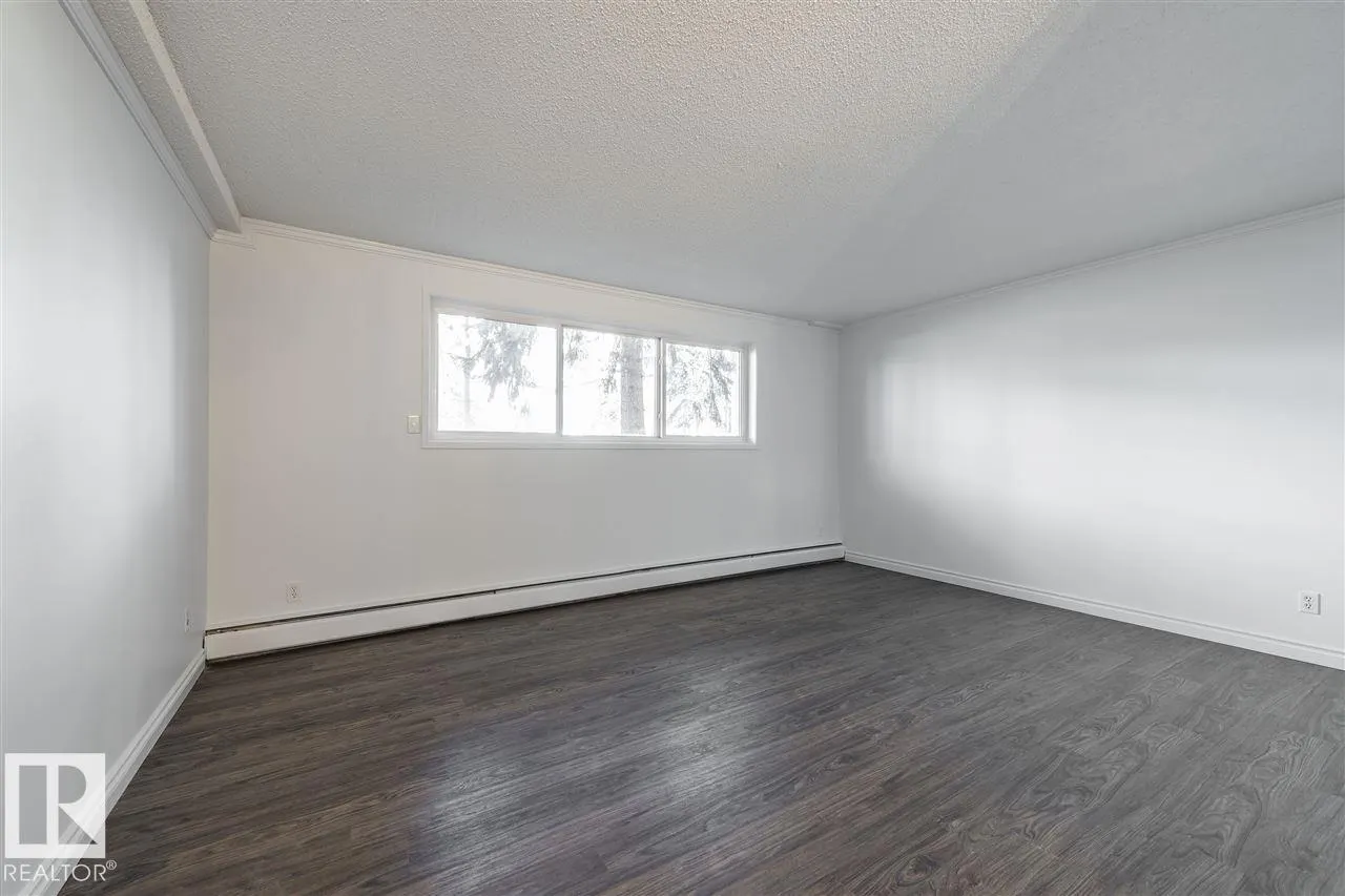 #102 10633 81 AV NW