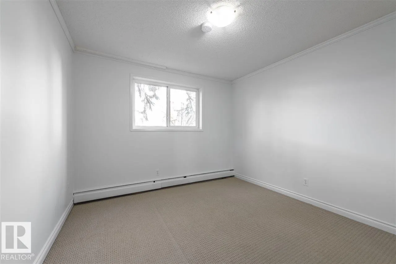 #102 10633 81 AV NW