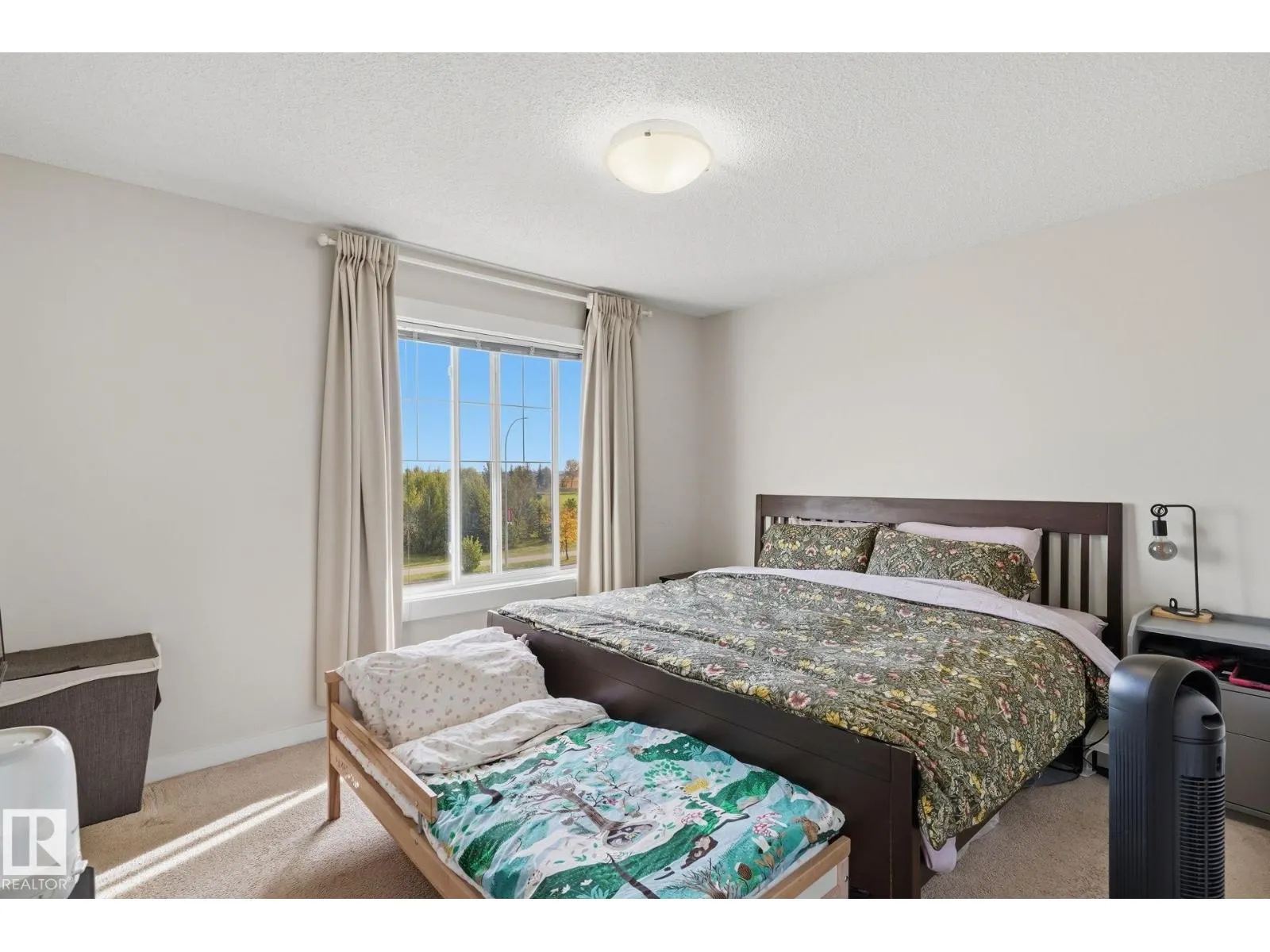 #106 8530 94 ST NE