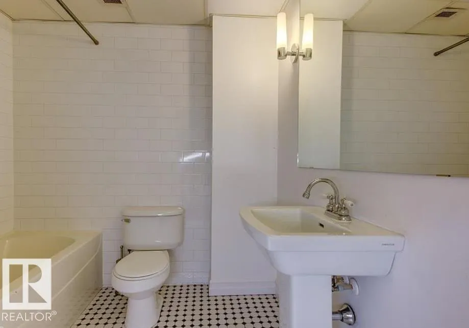 #210 10134 100 ST NW