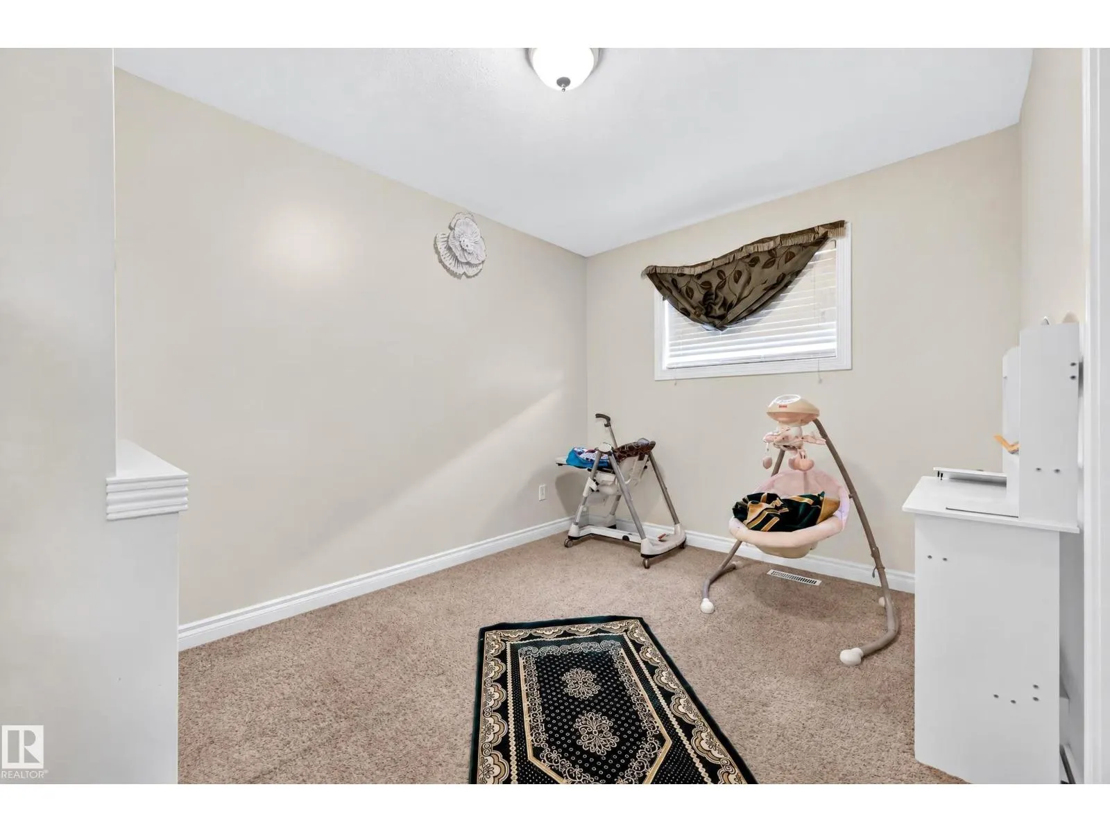 7718 166A AV NW
