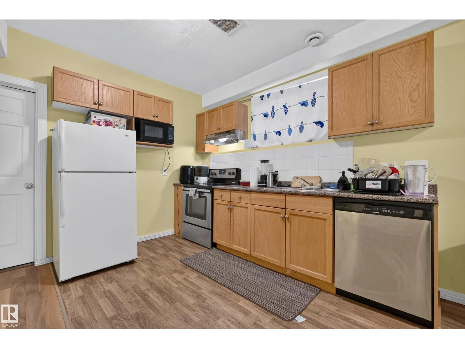 7718 166A AV NW