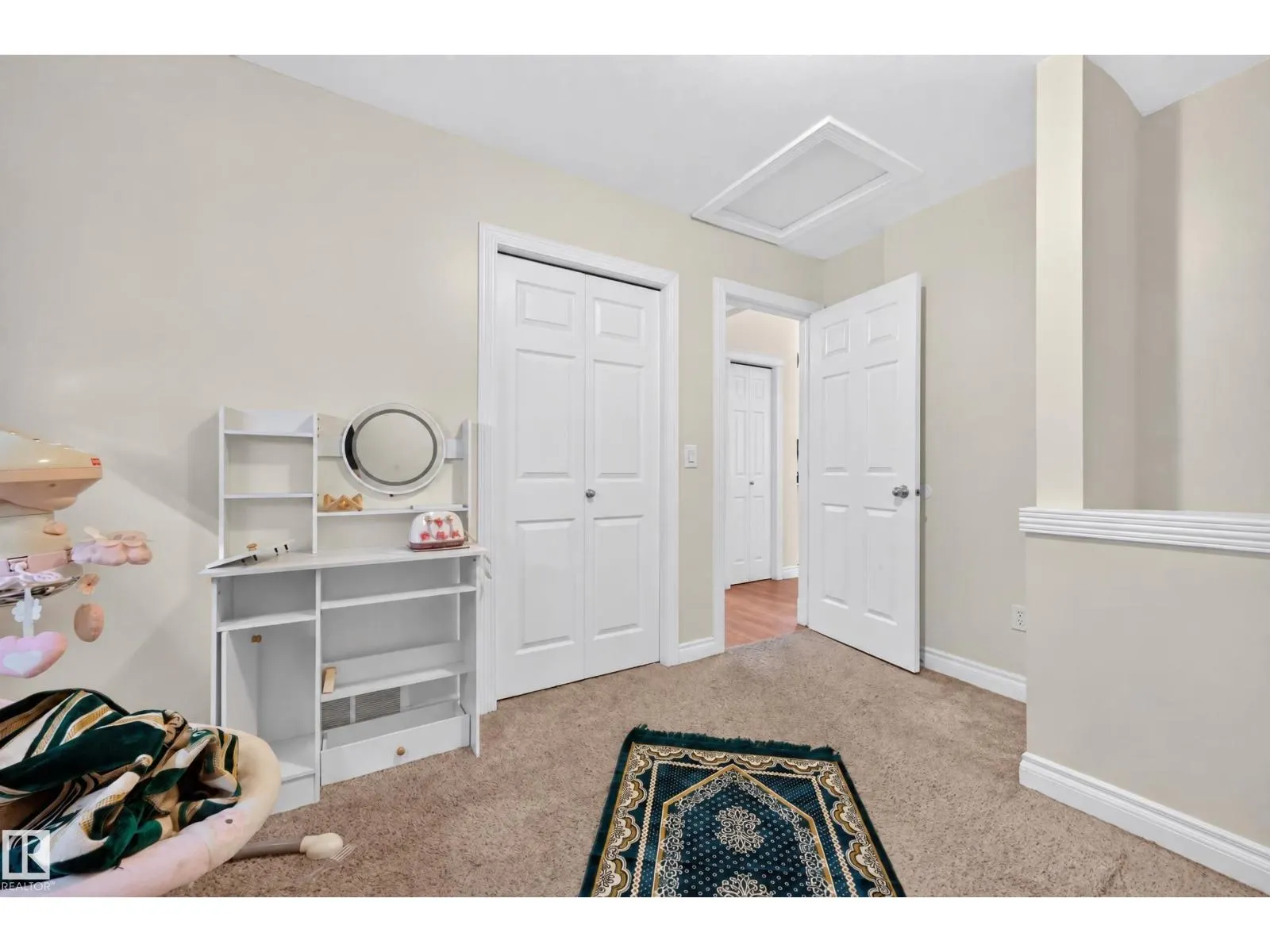 7718 166A AV NW