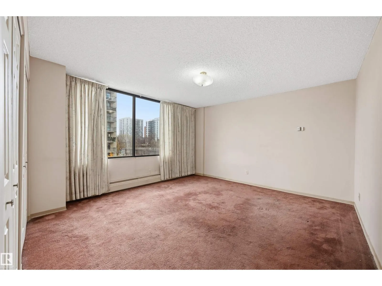 #407 10045 118 ST NW