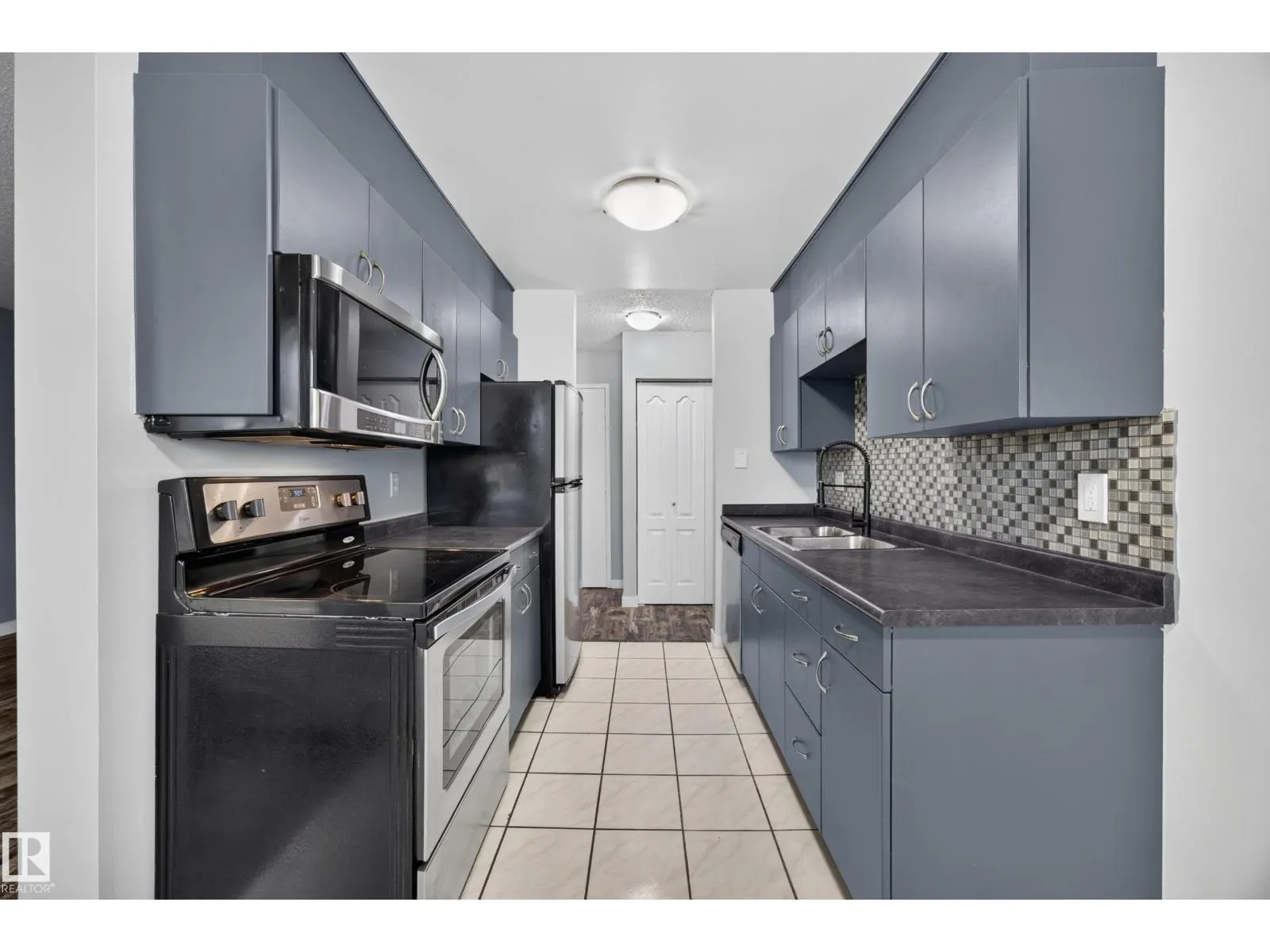 #27 11245 31 AV NW