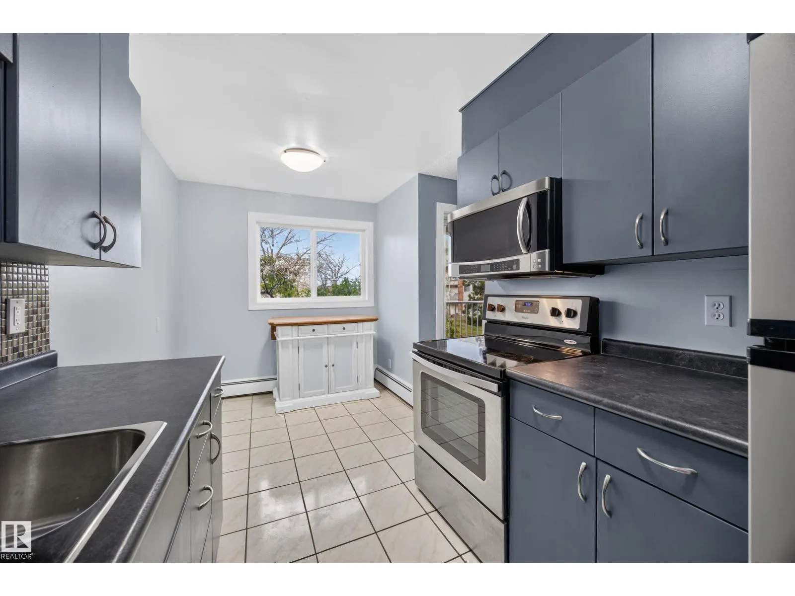 #27 11245 31 AV NW