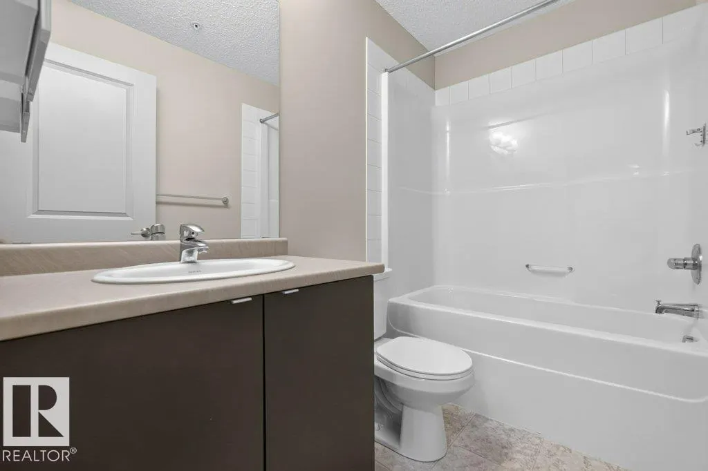 #103 508 ALBANY WY NW
