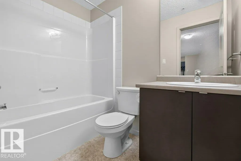 #103 508 ALBANY WY NW