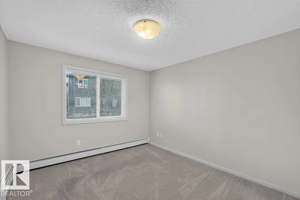 #103 508 ALBANY WY NW