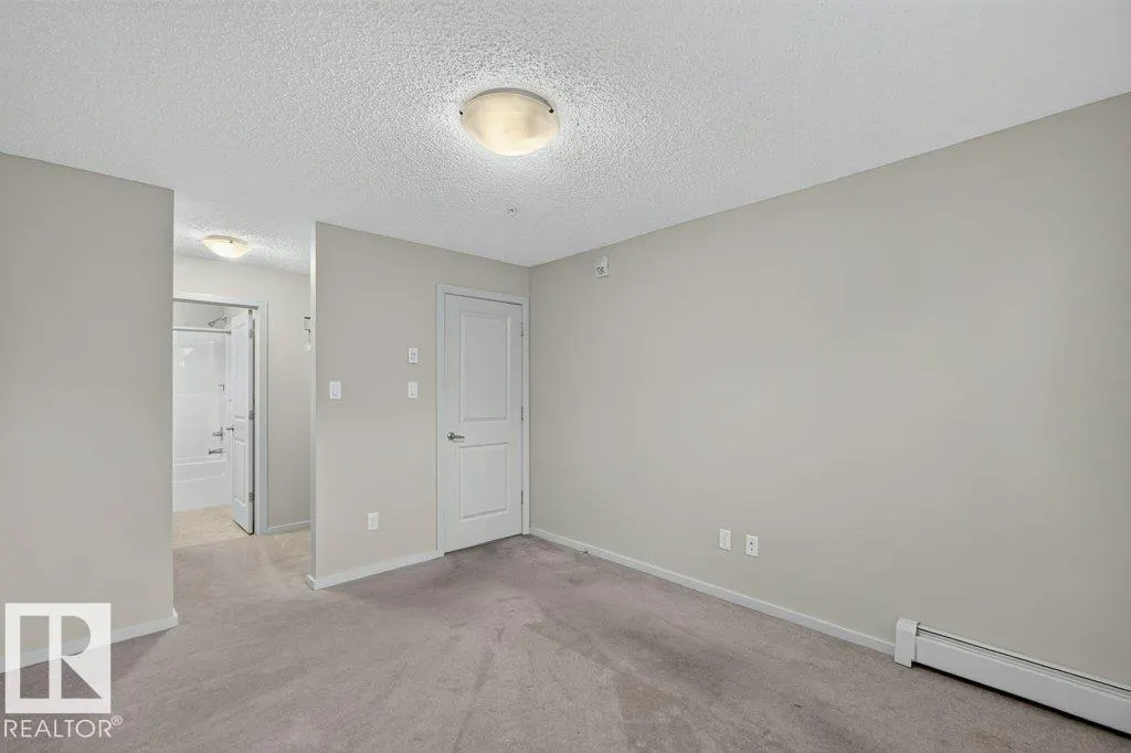 #103 508 ALBANY WY NW