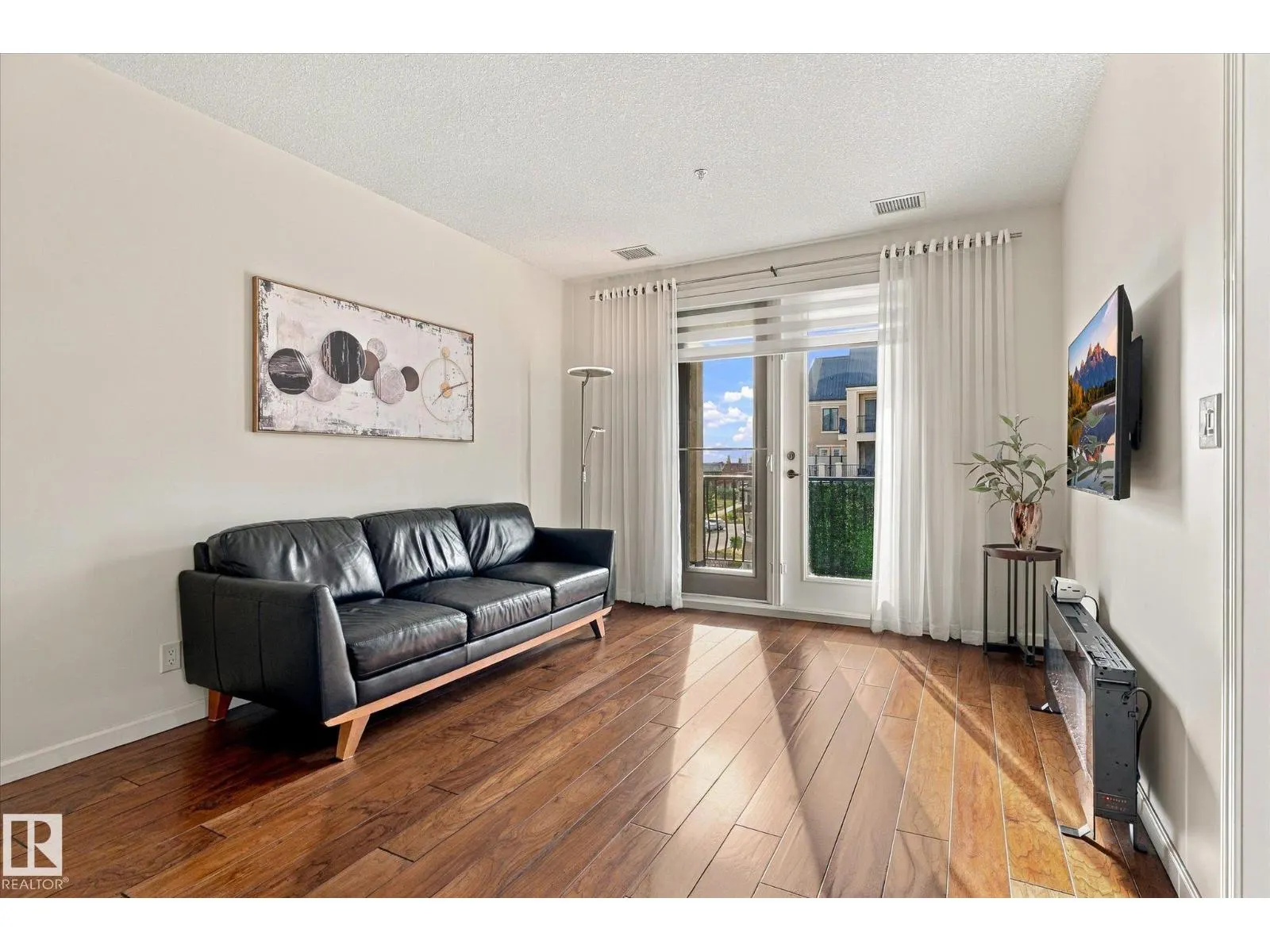 #306 6083 MAYNARD WY NW