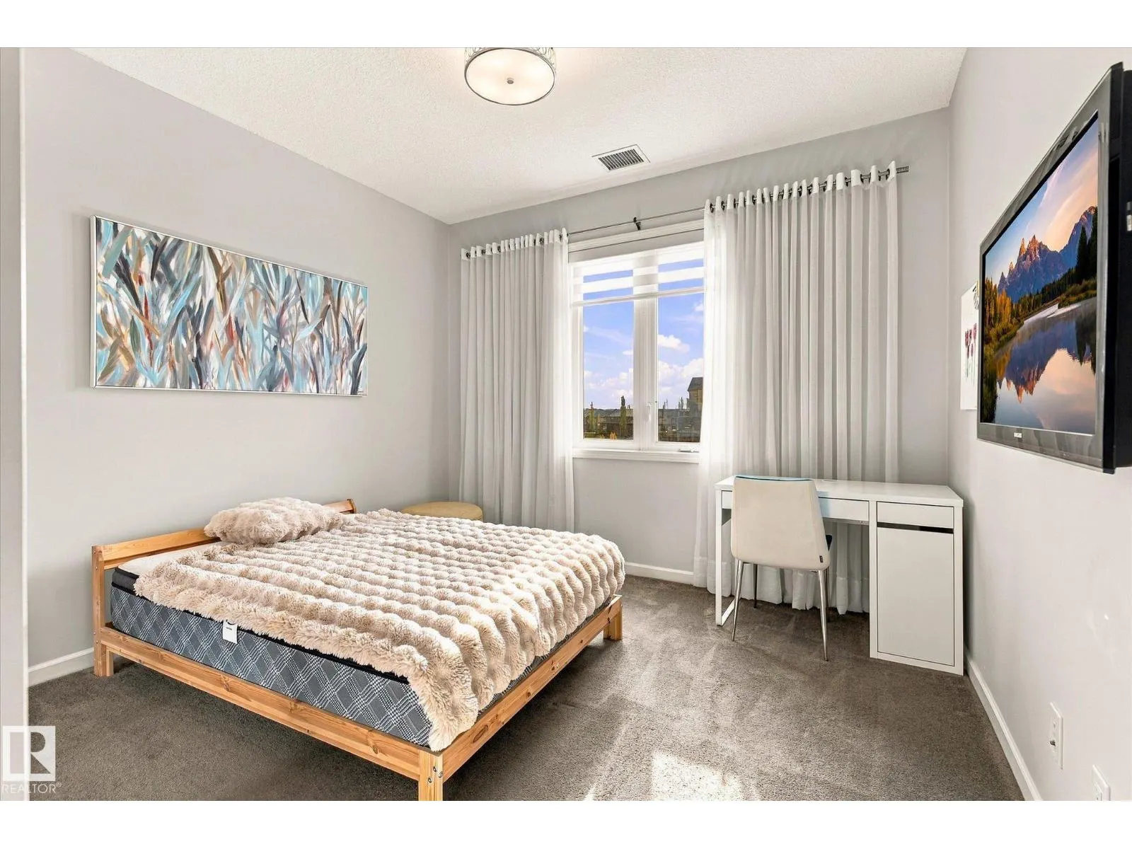 #306 6083 MAYNARD WY NW