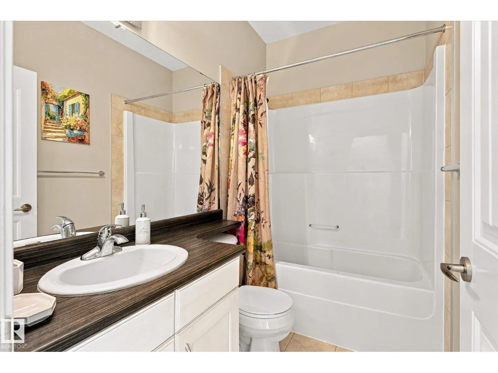 #306 6083 MAYNARD WY NW