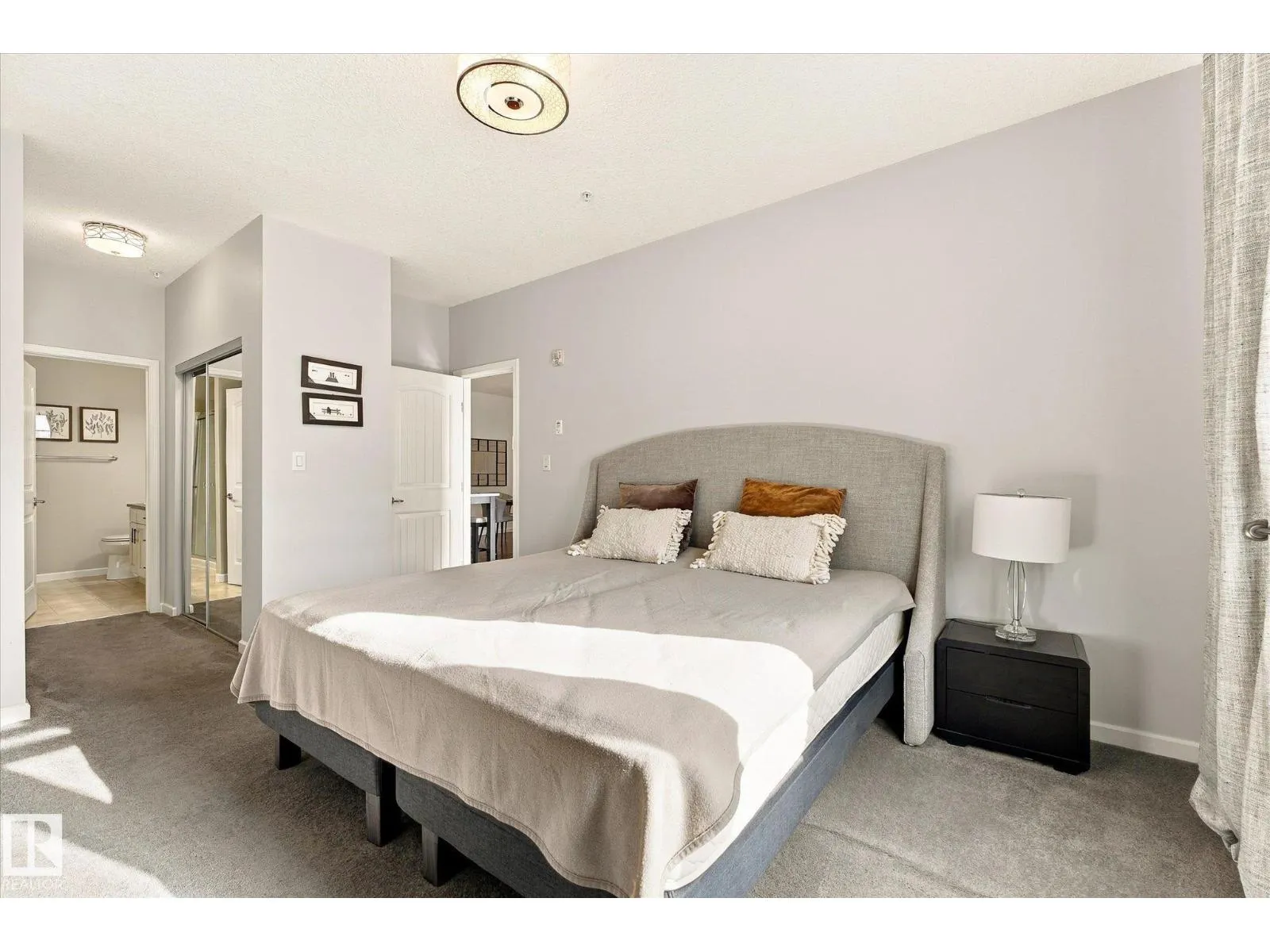 #306 6083 MAYNARD WY NW