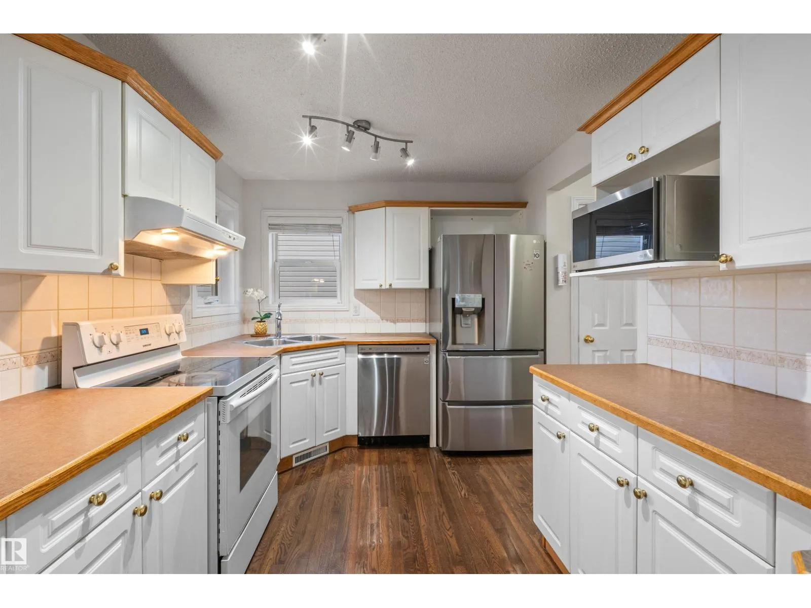 305 WILD ROSE WY NW