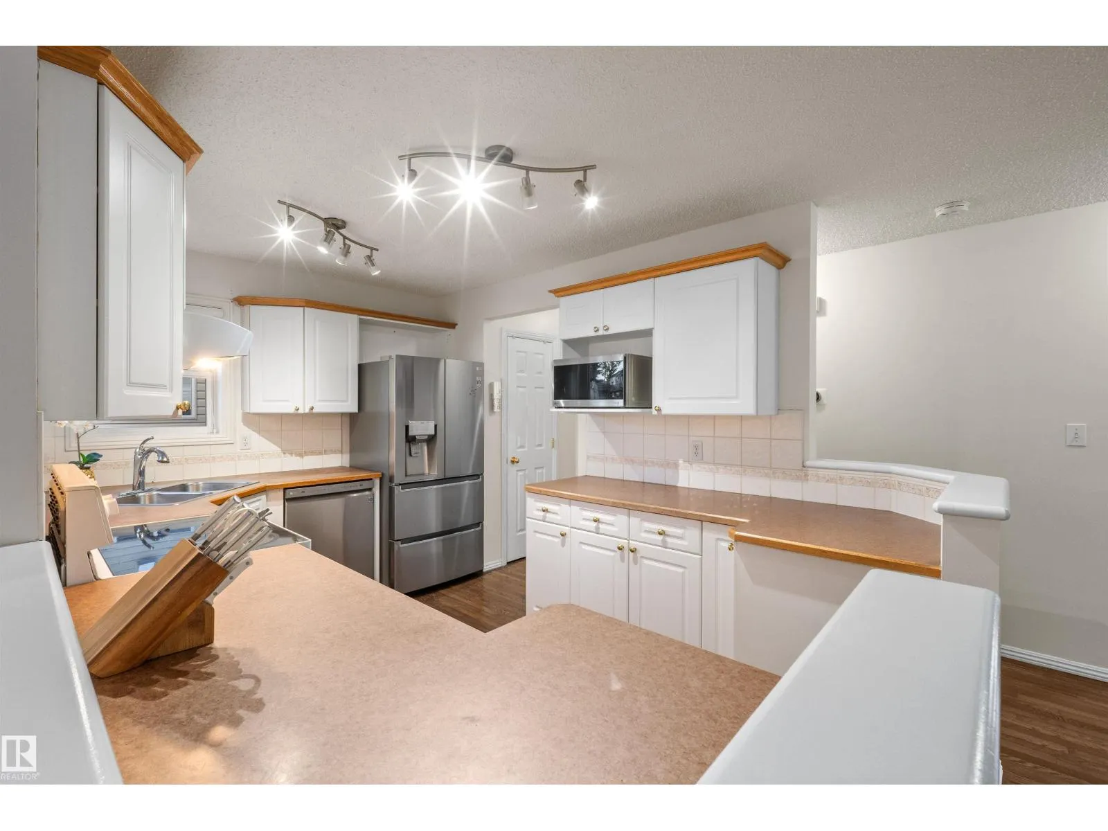 305 WILD ROSE WY NW