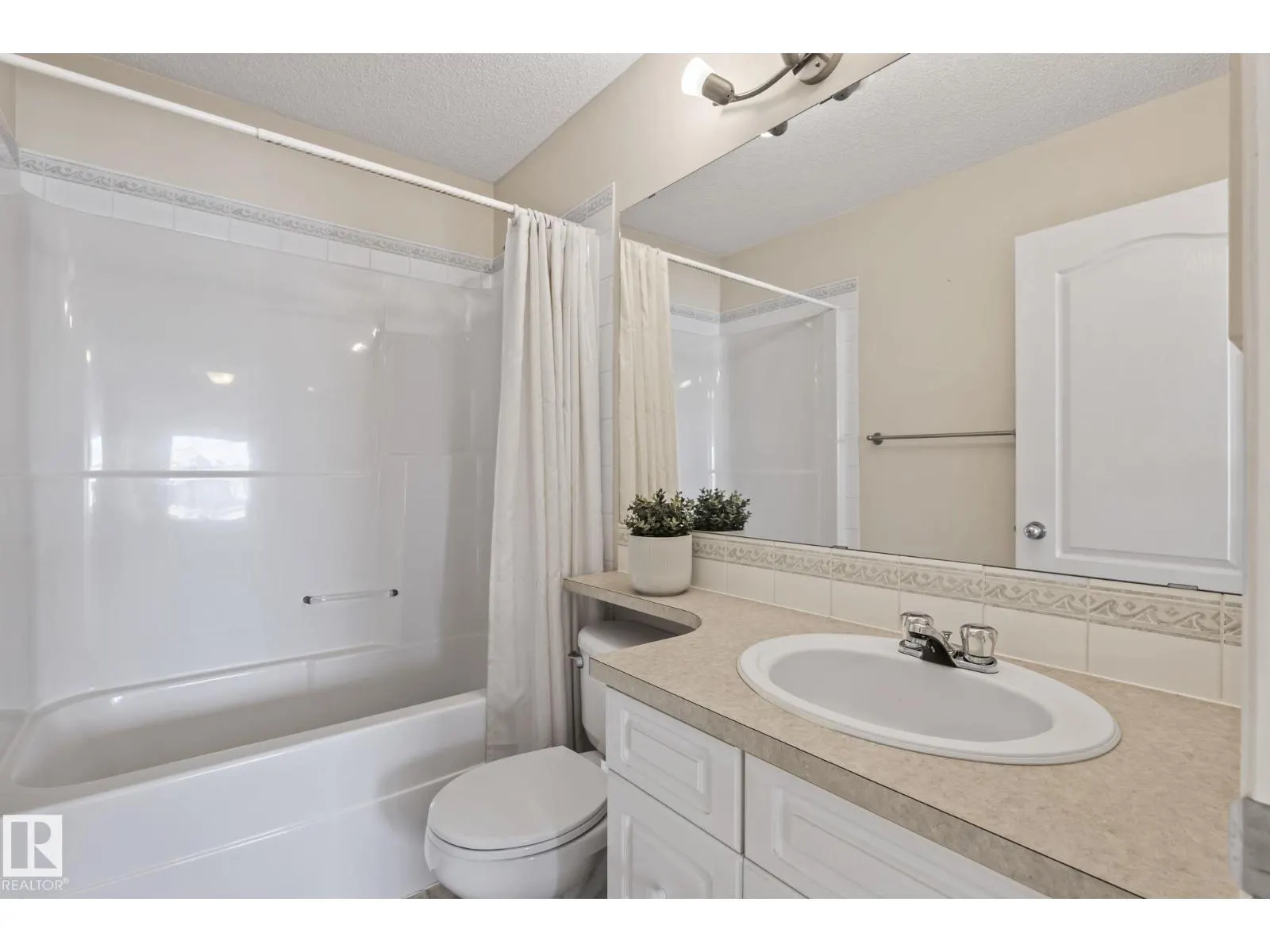 11727 13 AV NW