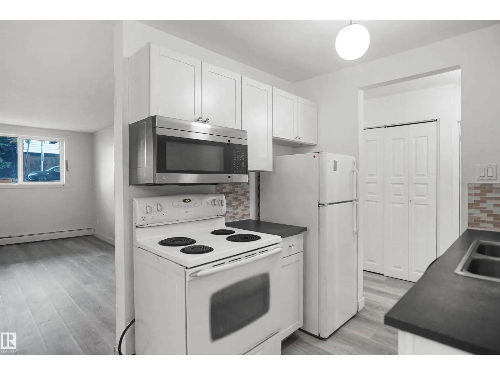 #102 10140 151 ST NW NW